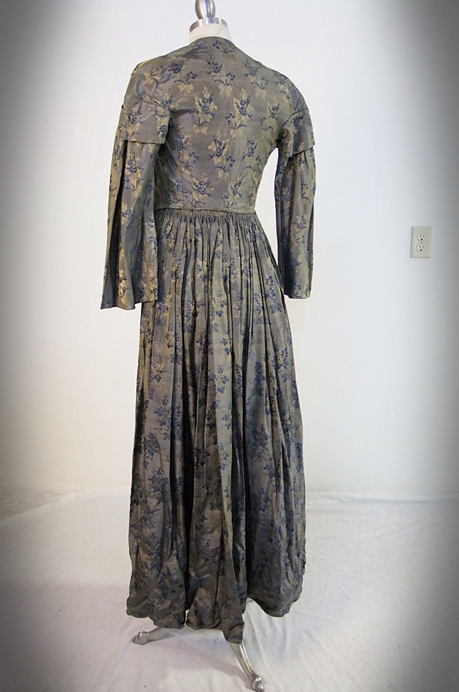 19th Century silk brocade gown in a slate blue gray with royal blue and cream floral sprays 