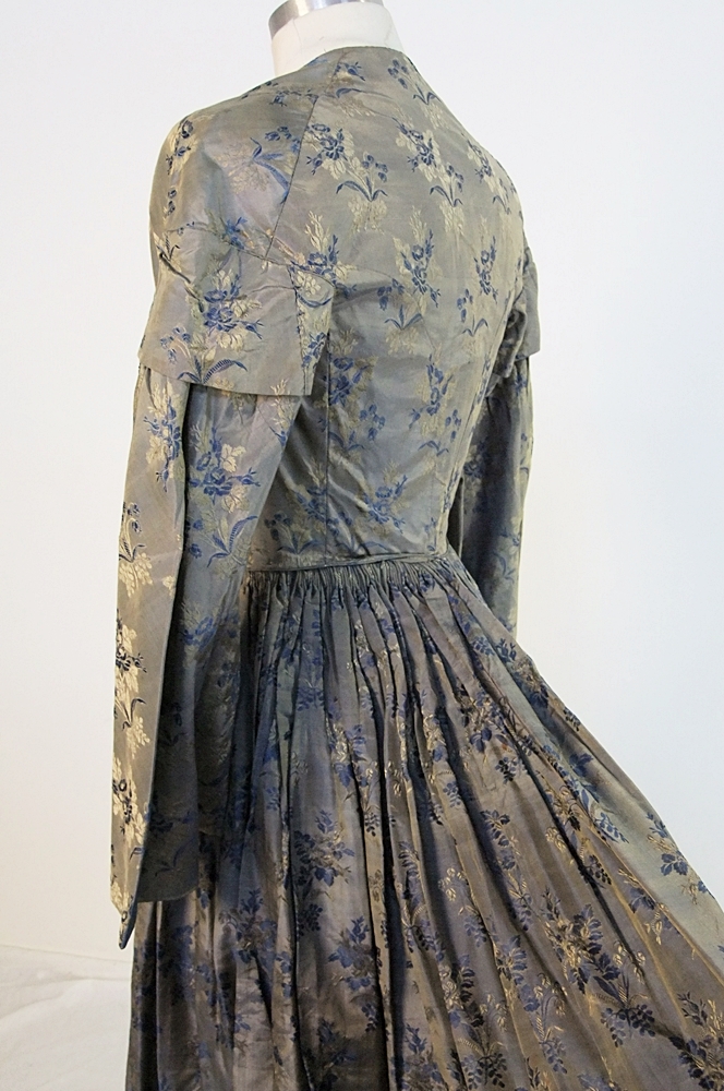 19th Century silk brocade gown in a slate blue gray with royal blue and cream floral sprays 