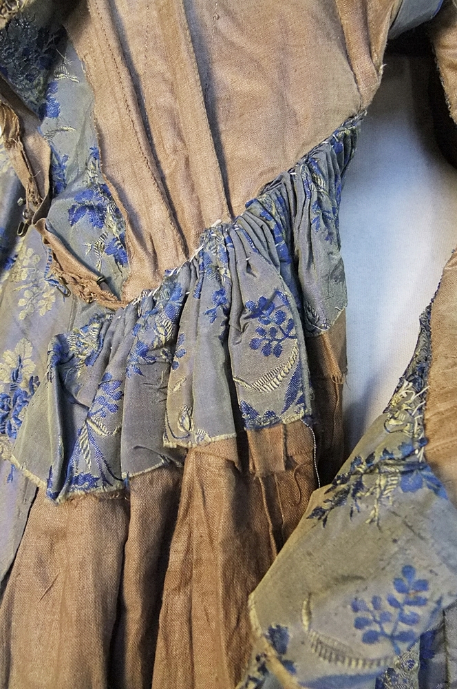 19th Century silk brocade gown in a slate blue gray with royal blue and cream floral sprays 