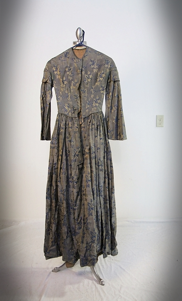 19th Century silk brocade gown in a slate blue gray with royal blue and cream floral sprays 