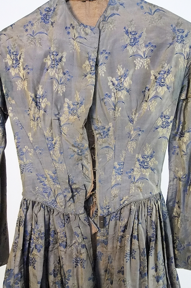 19th Century silk brocade gown in a slate blue gray with royal blue and cream floral sprays 