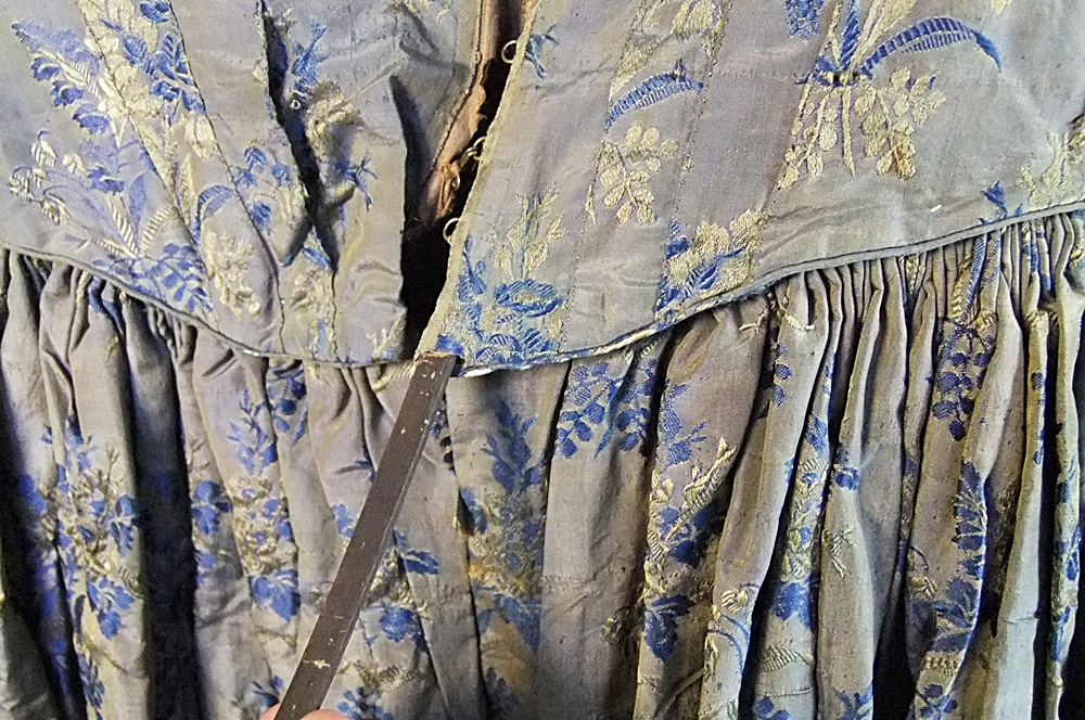 19th Century silk brocade gown in a slate blue gray with royal blue and cream floral sprays 