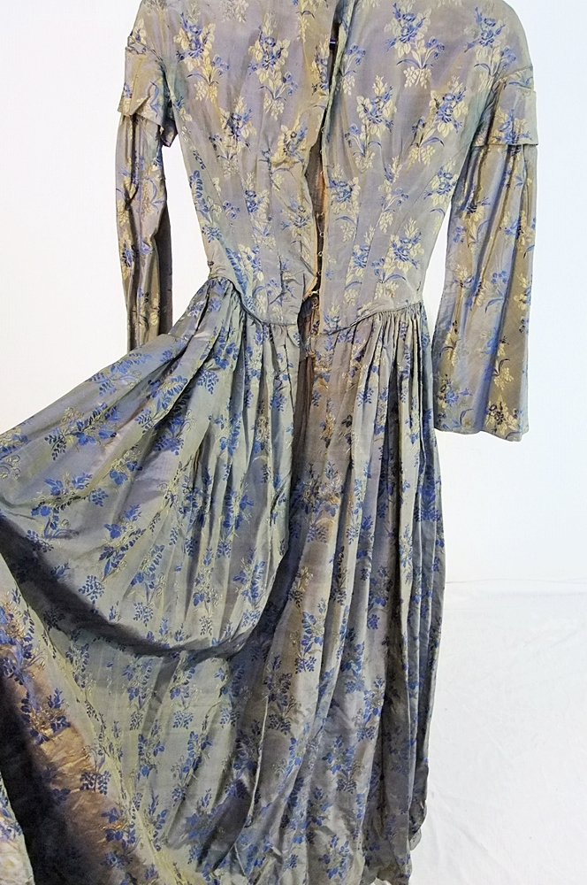 19th Century silk brocade gown in a slate blue gray with royal blue and cream floral sprays 