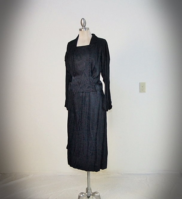 1930's midnight blue silk dress featuring monochromatic dome shaped silk buttoned panel