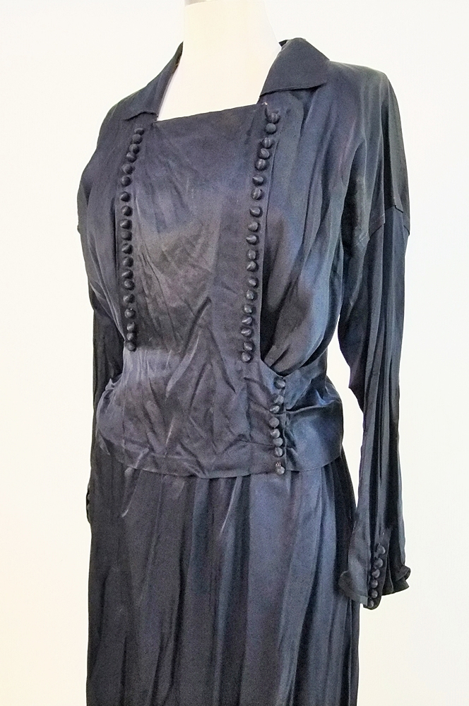 1930's midnight blue silk dress featuring monochromatic dome shaped silk buttoned panel