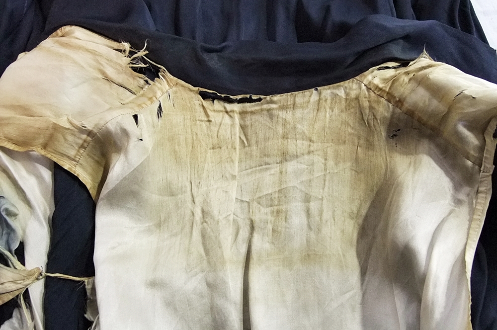 1930's midnight blue silk dress featuring monochromatic dome shaped silk buttoned panel