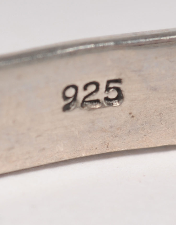 Sterling silver bracelet with garnet and openwork Celtic knots 