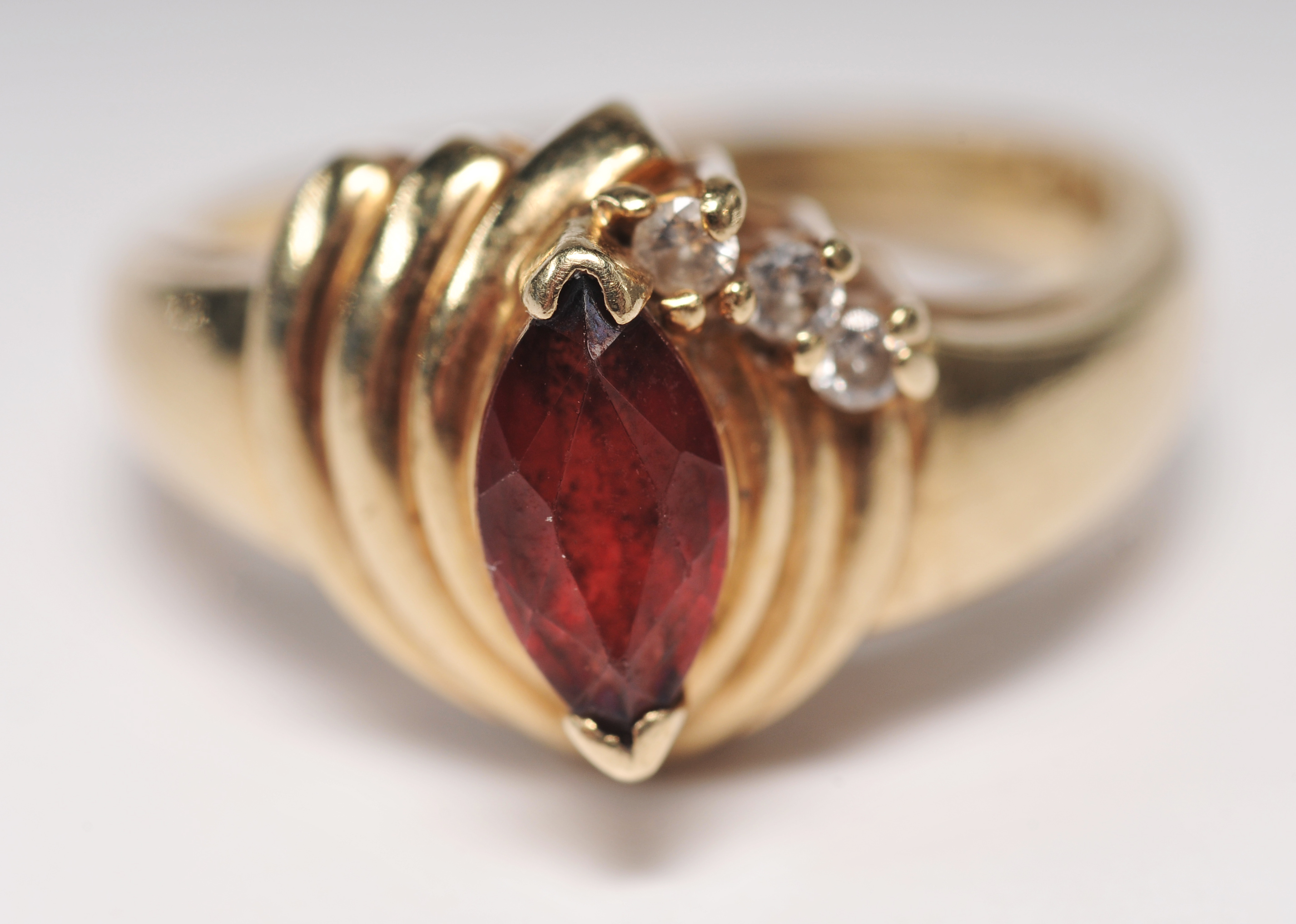 Ladies 10 K yellow gold and garnet ring