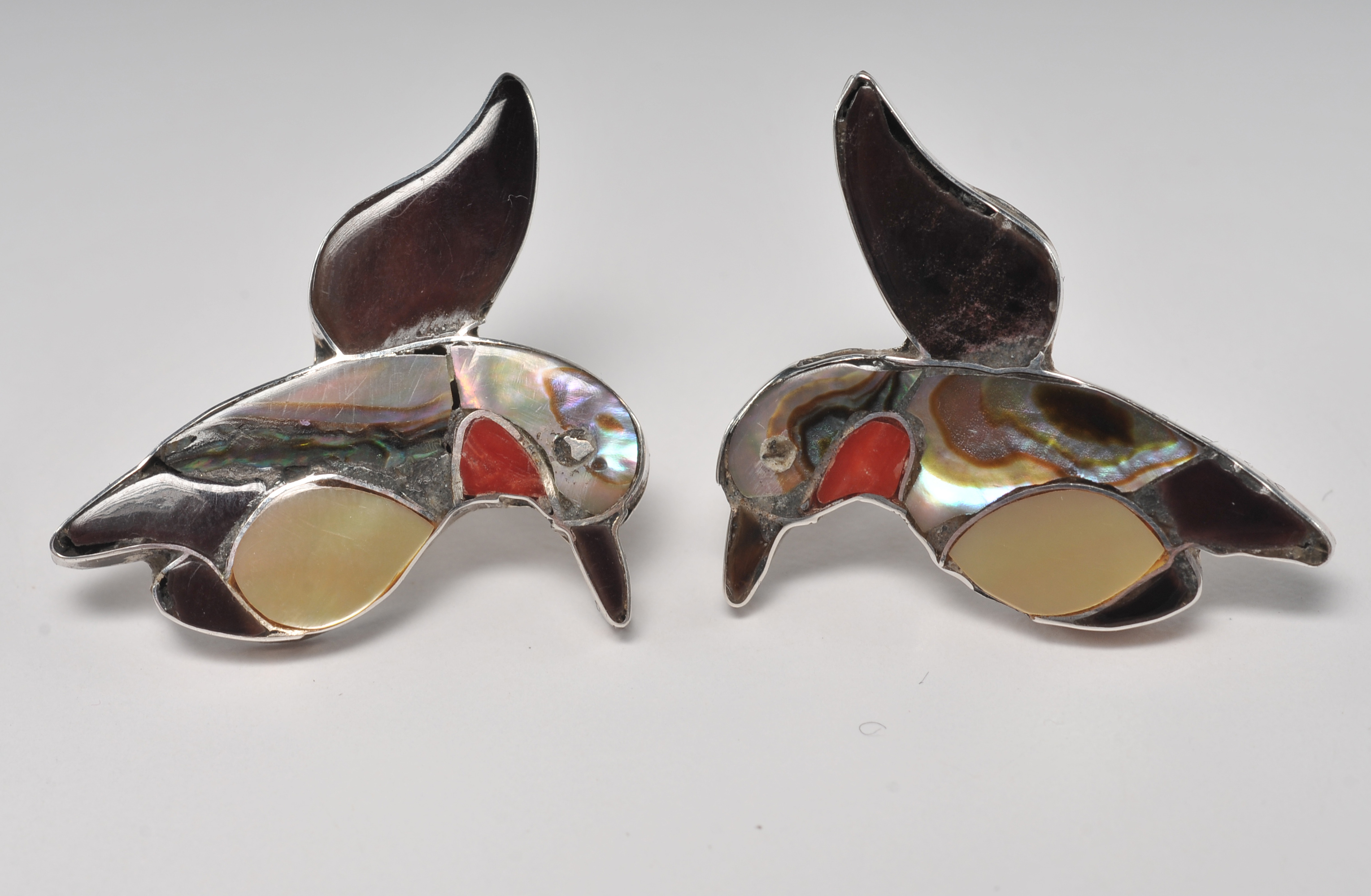 Three pair of sterling silver earrings including a pair Zuni Hummingbird earrings