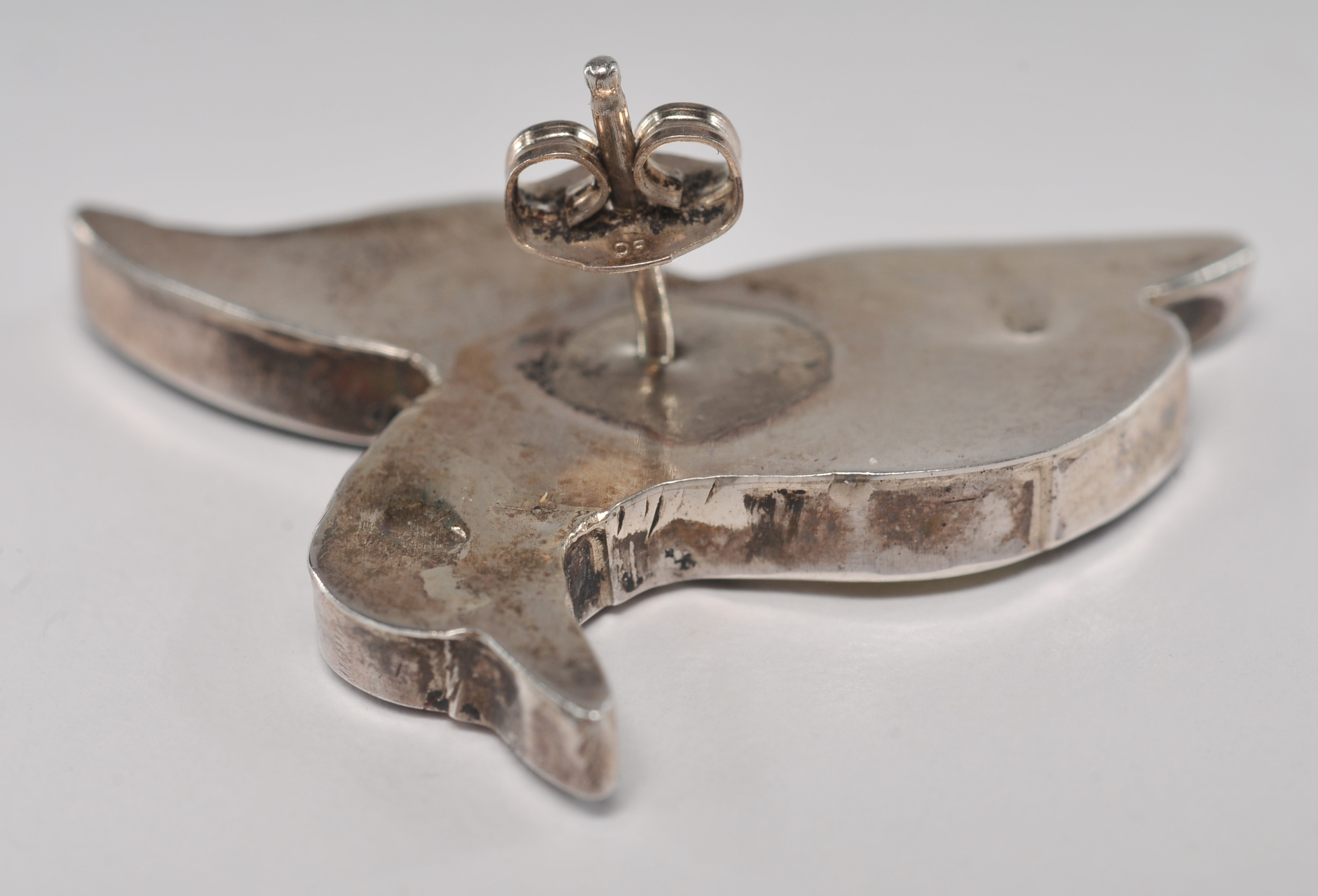 Three pair of sterling silver earrings including a pair Zuni Hummingbird earrings