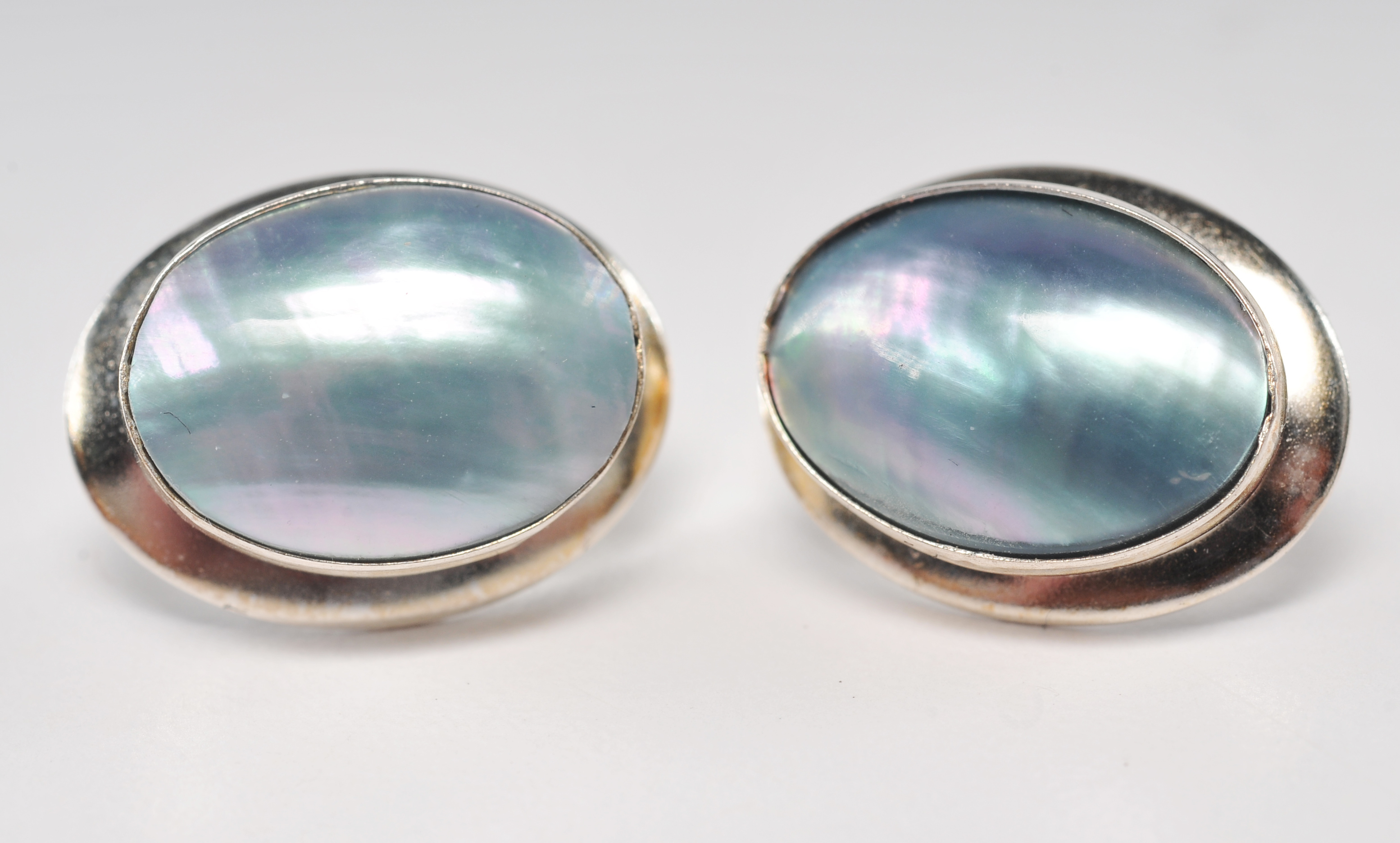 Three pair of sterling silver earrings including a pair Zuni Hummingbird earrings