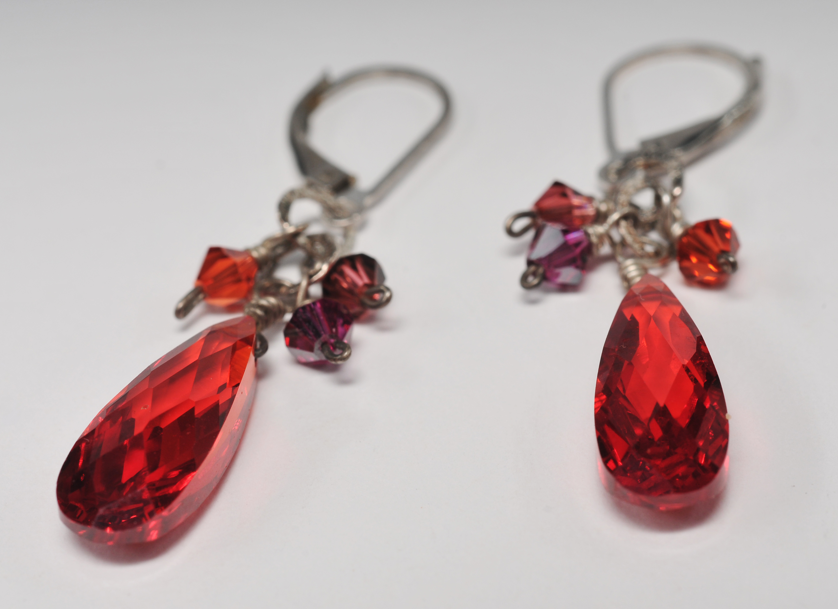 Three pair of sterling silver earrings including a pair Zuni Hummingbird earrings