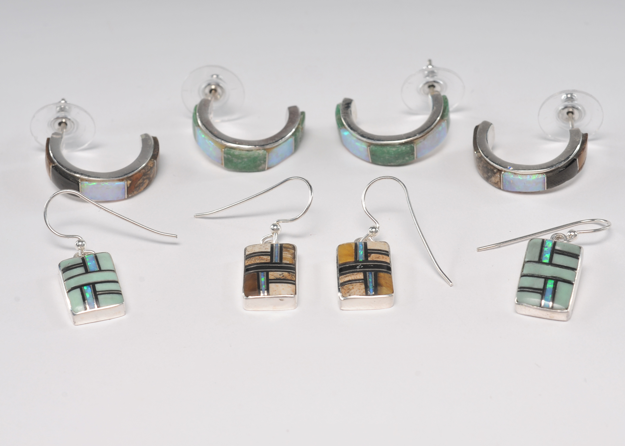 Four pair of sterling silver Navajo made post back earrings 