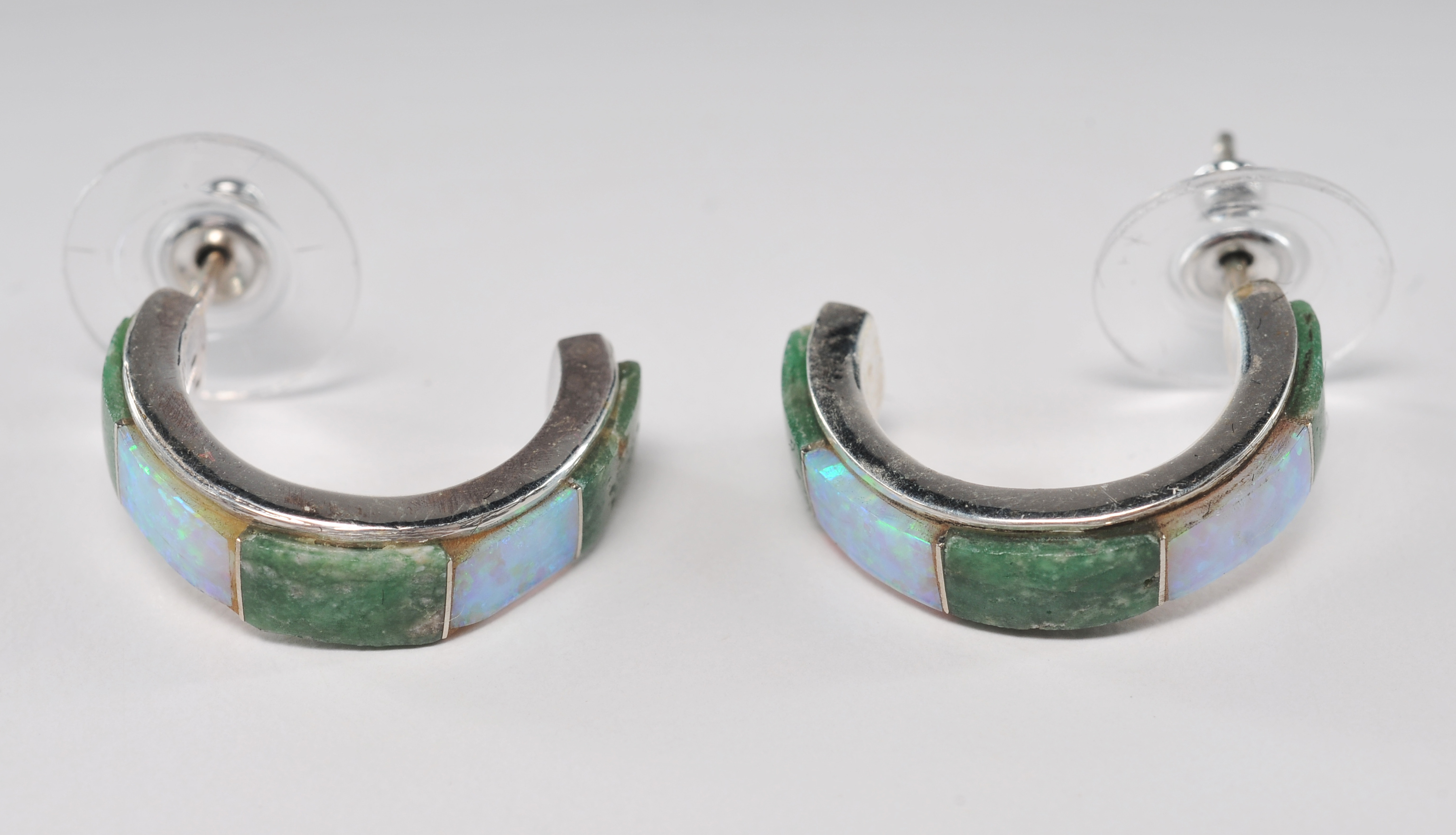 Four pair of sterling silver Navajo made post back earrings 