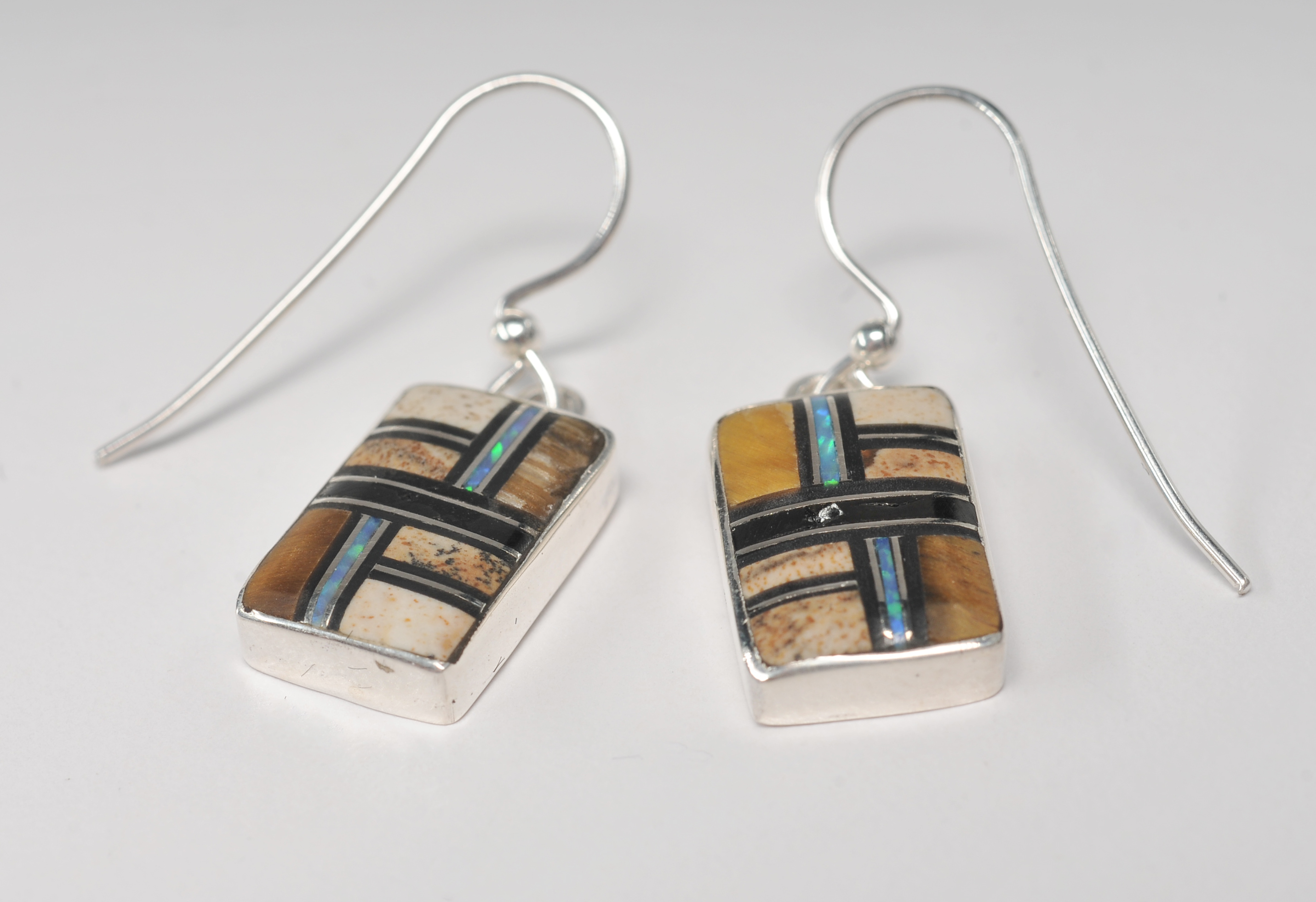 Four pair of sterling silver Navajo made post back earrings 