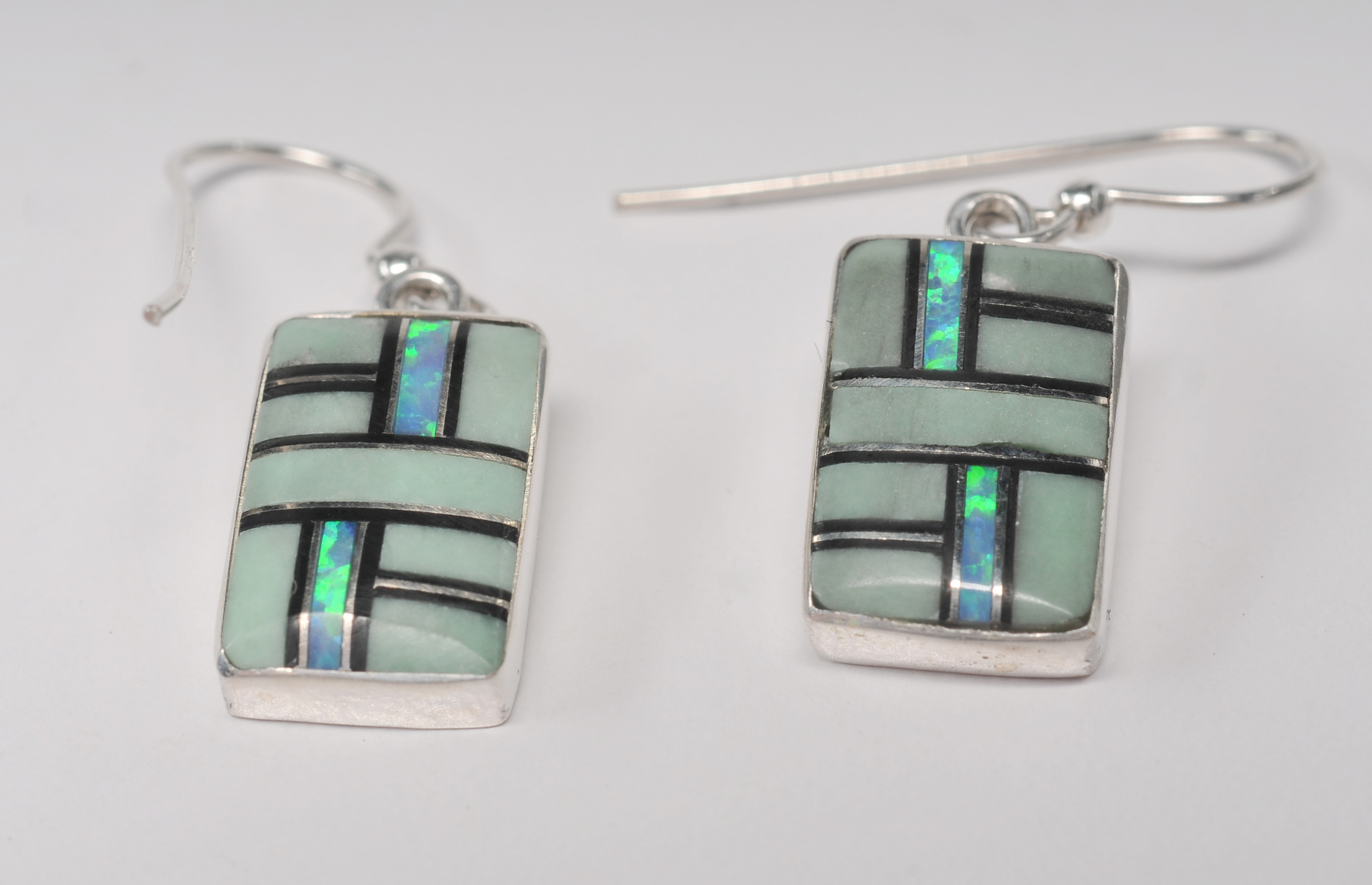 Four pair of sterling silver Navajo made post back earrings 