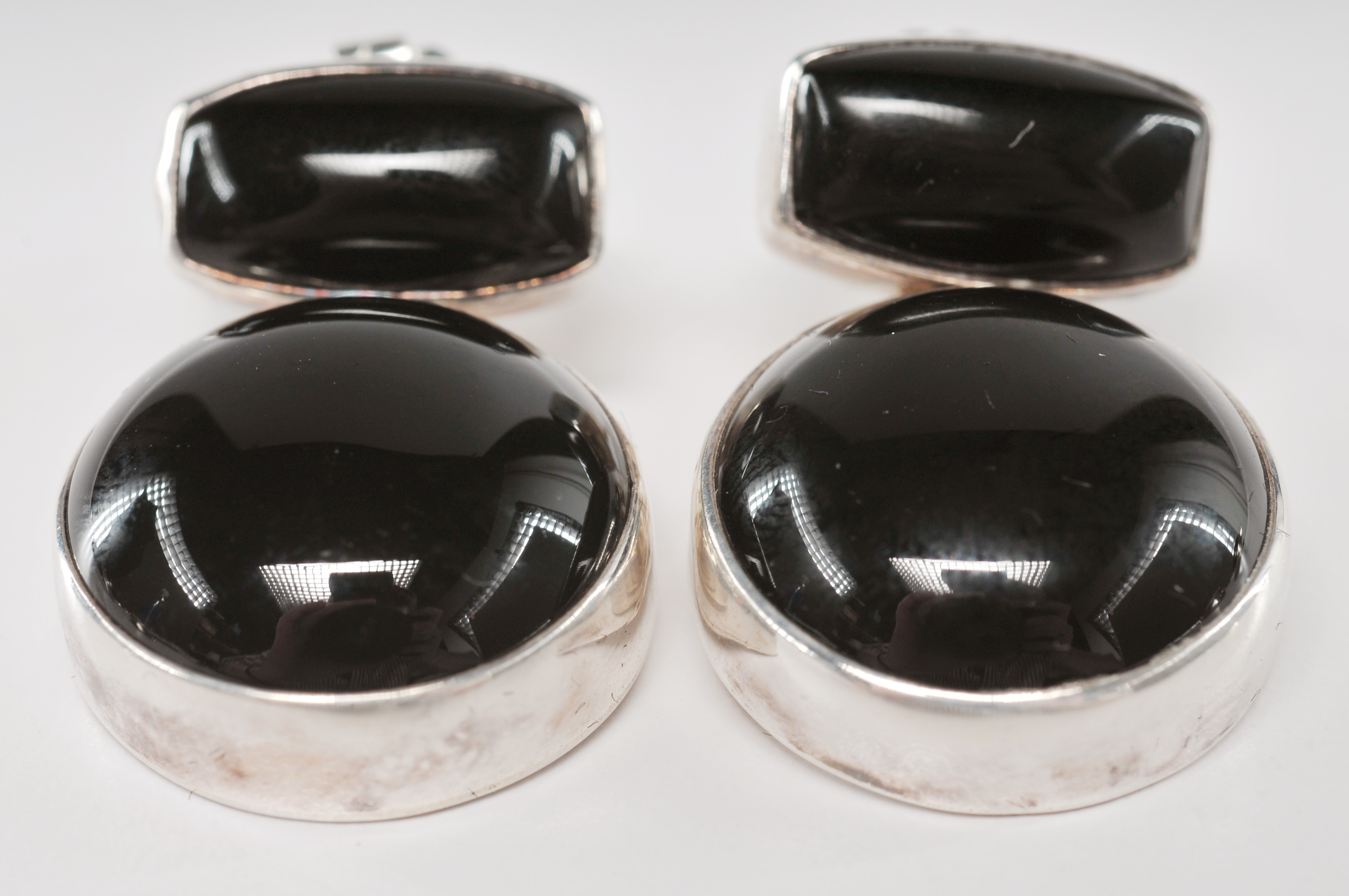 Four pair of sterling silver Navajo made post back earrings 