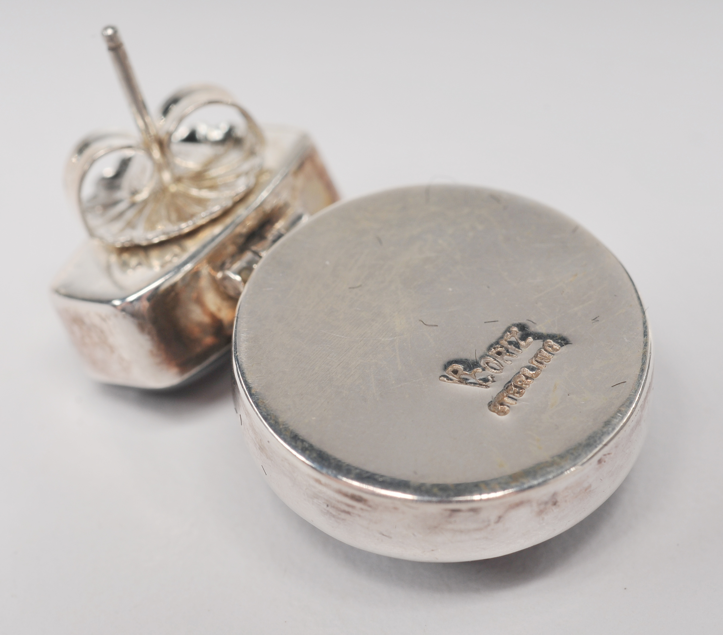 Four pair of sterling silver Navajo made post back earrings 