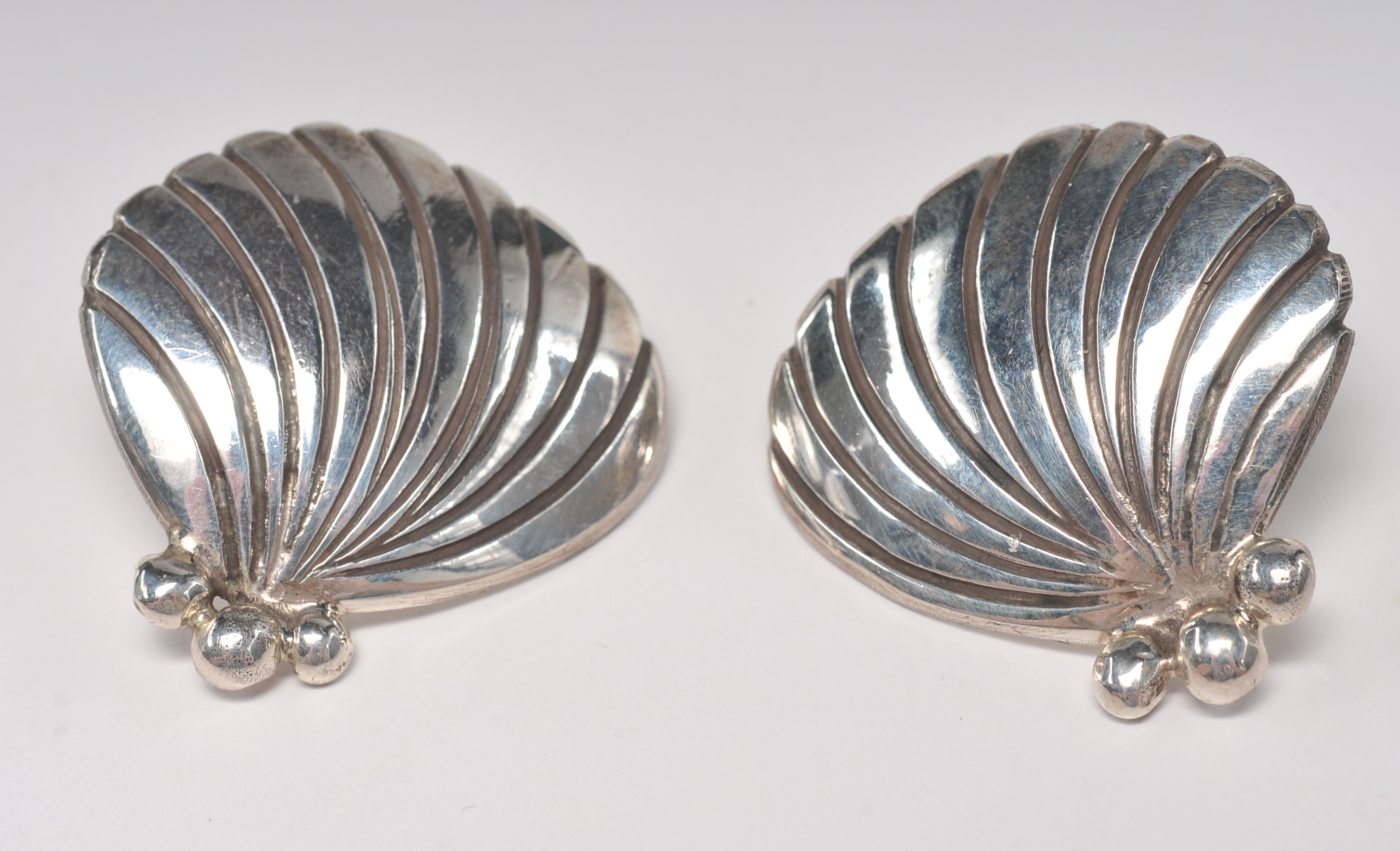 Four pair of sterling silver Navajo made post back earrings 