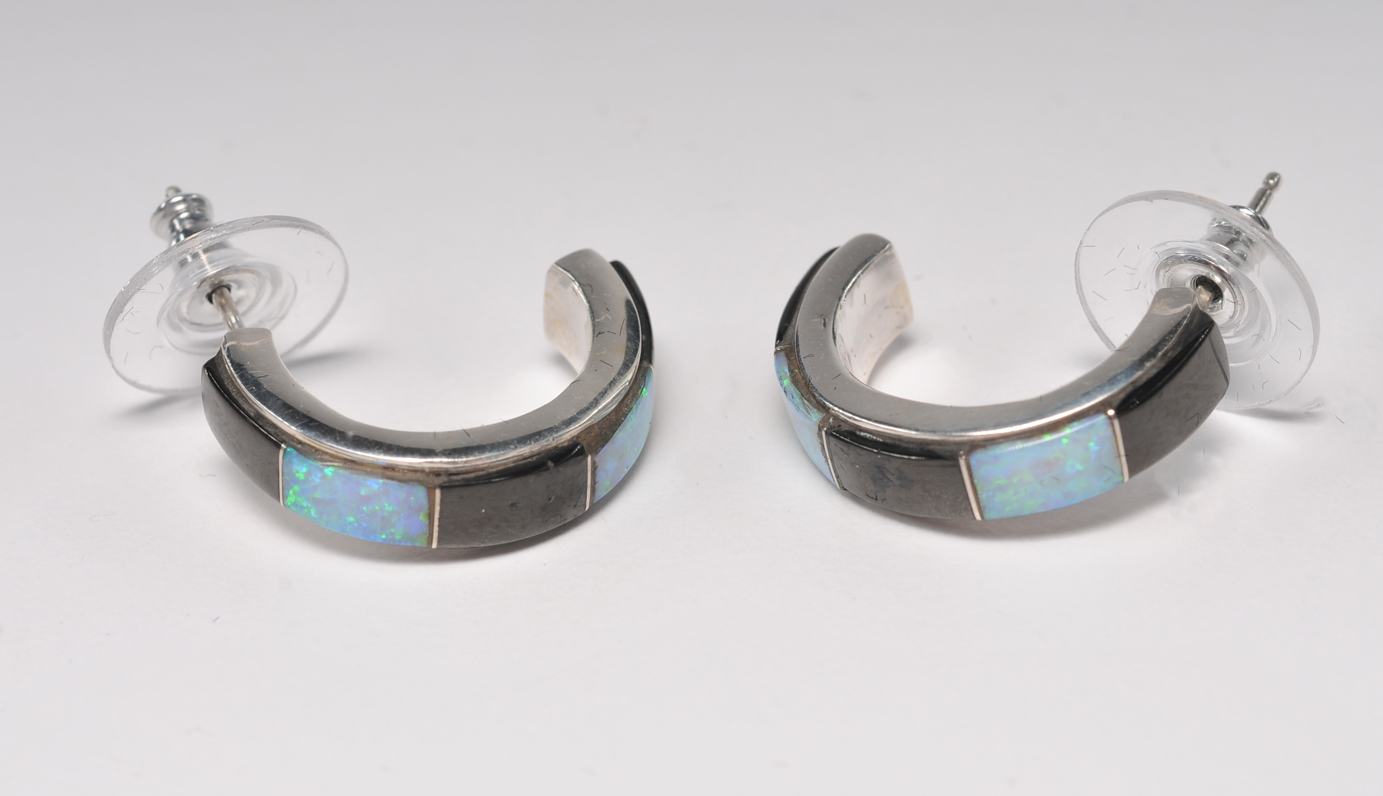 Four pair of sterling silver Navajo made post back earrings 