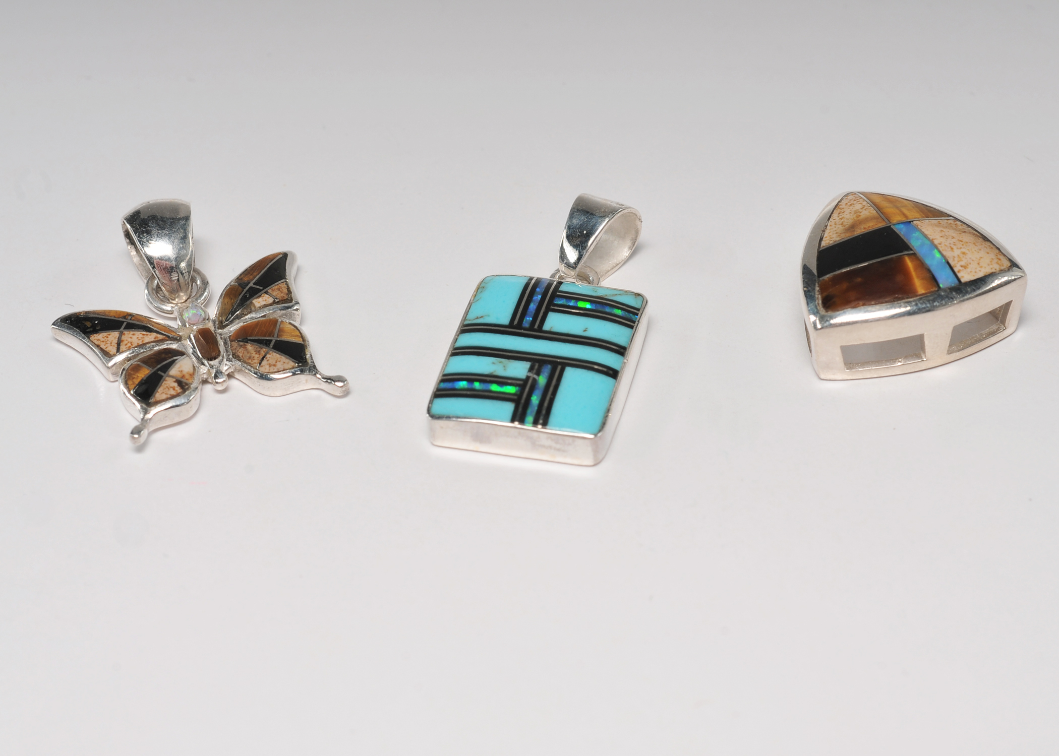Sterling silver inlaid Southwestern style jewelry