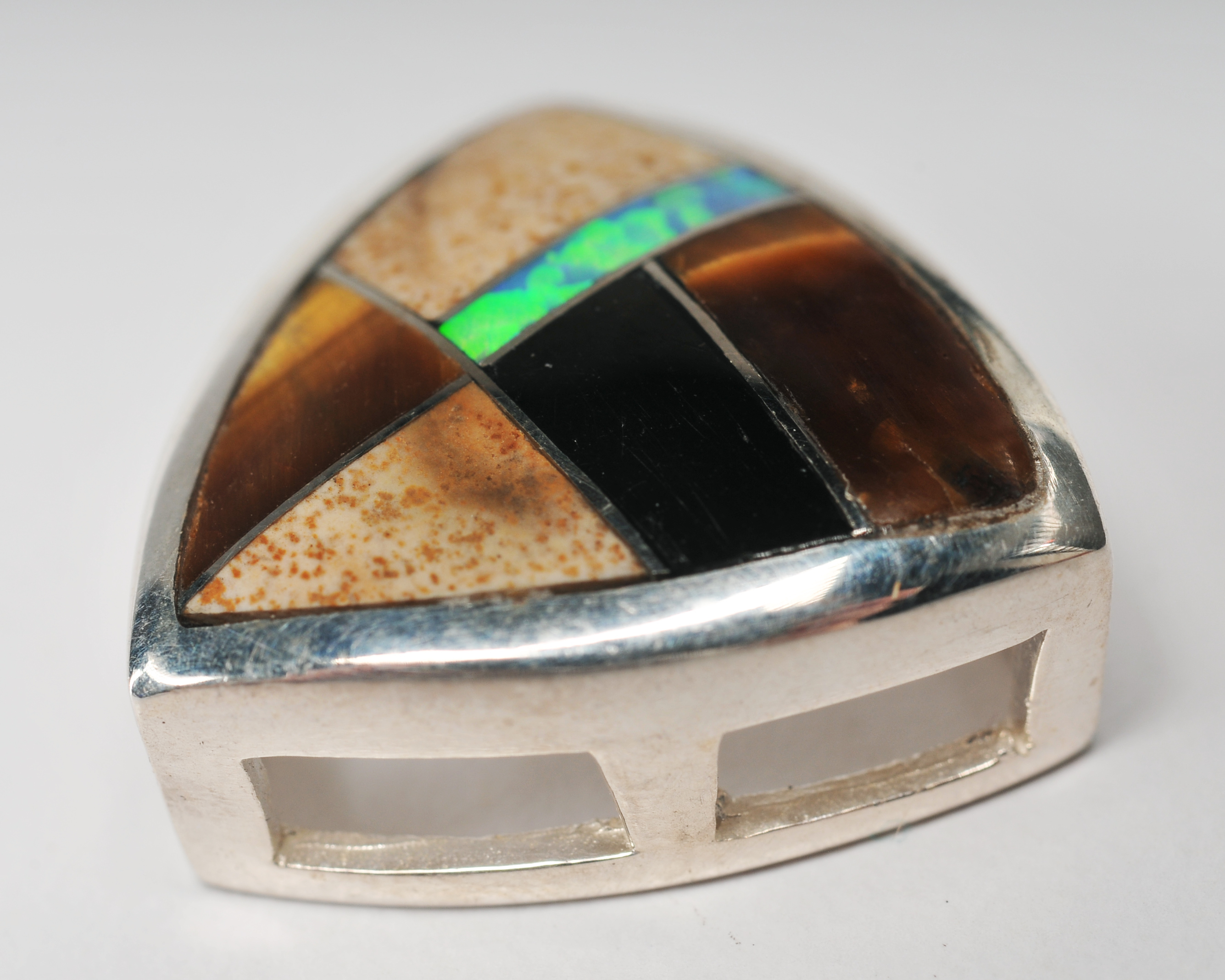 Sterling silver inlaid Southwestern style jewelry