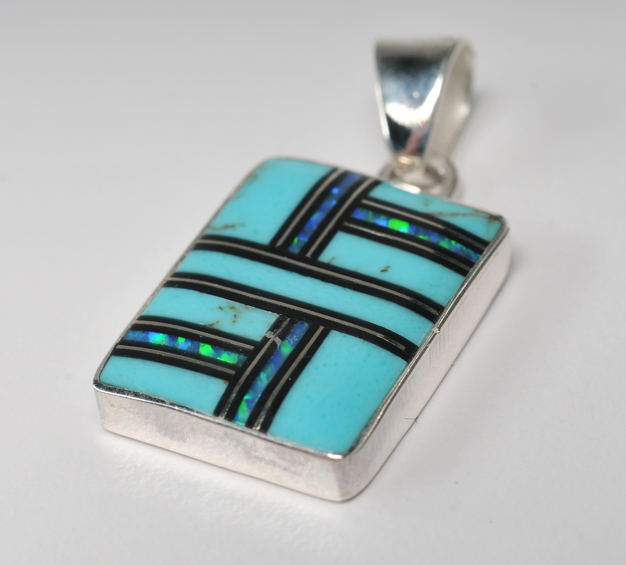 Sterling silver inlaid Southwestern style jewelry