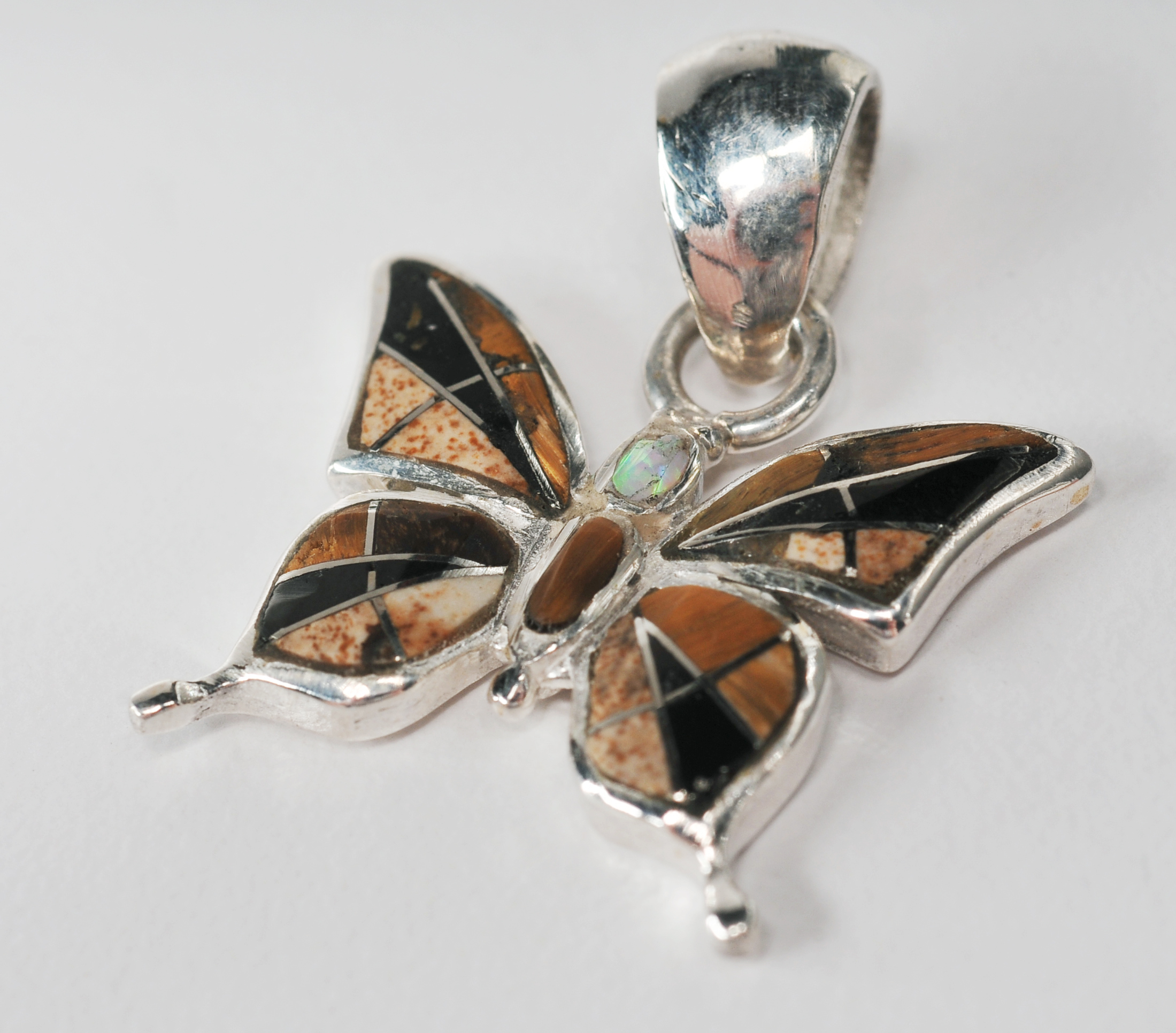 Sterling silver inlaid Southwestern style jewelry