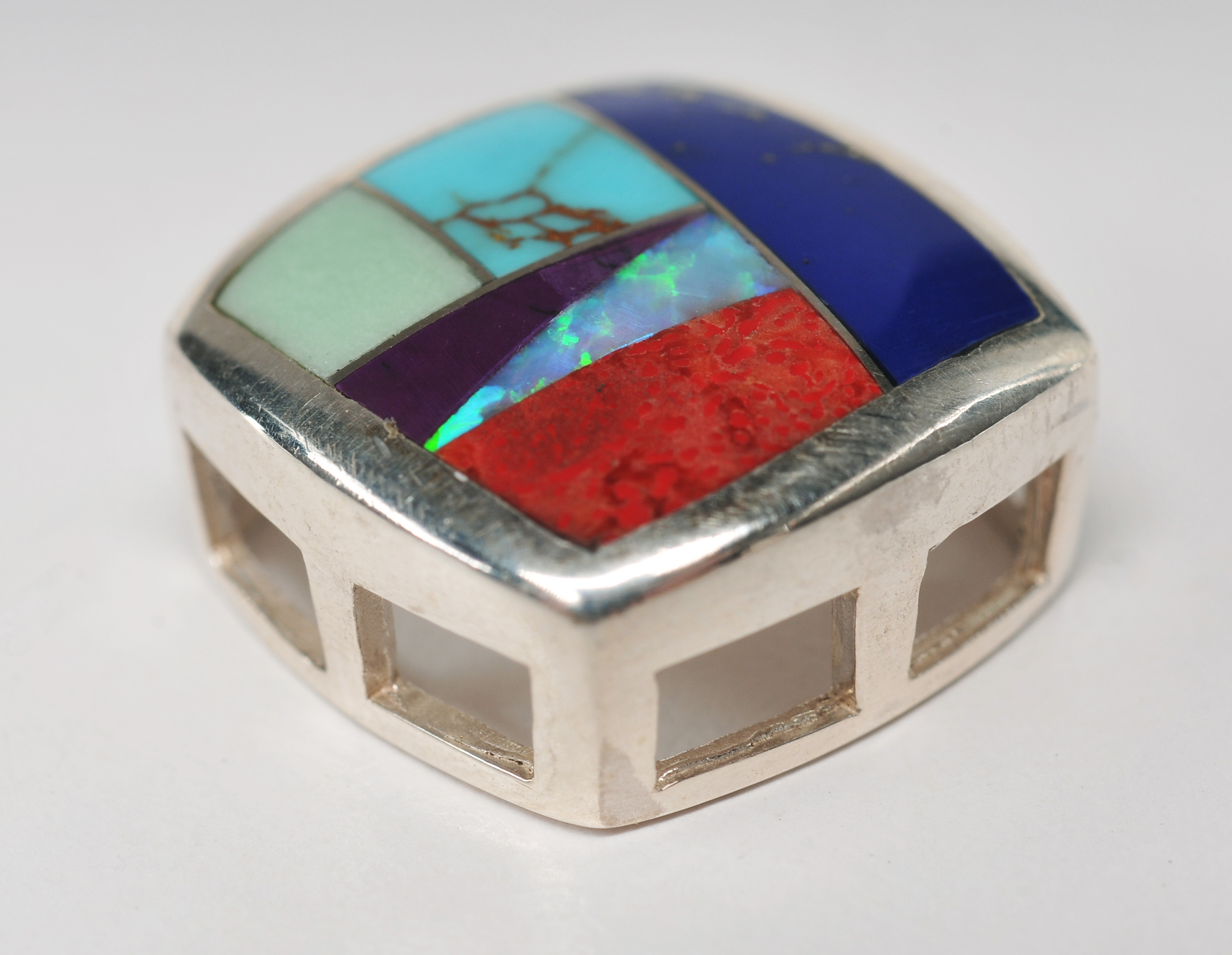 Sterling silver inlaid Southwestern style jewelry