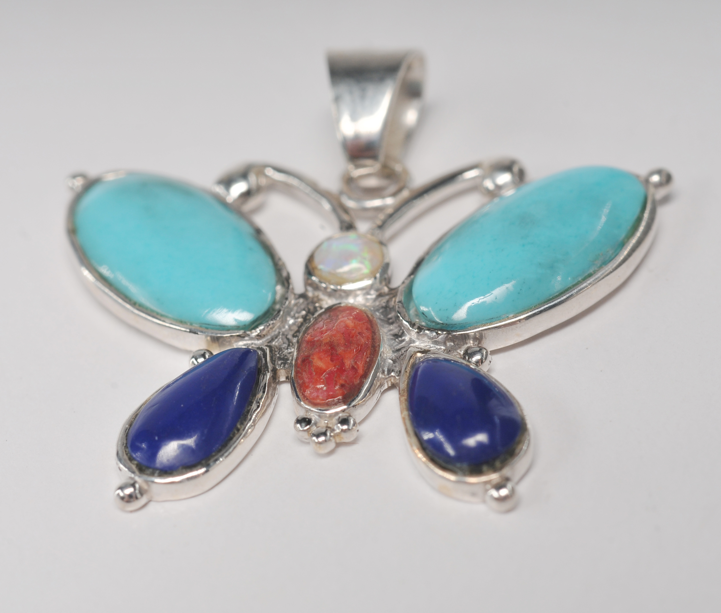 Sterling silver inlaid Southwestern style jewelry