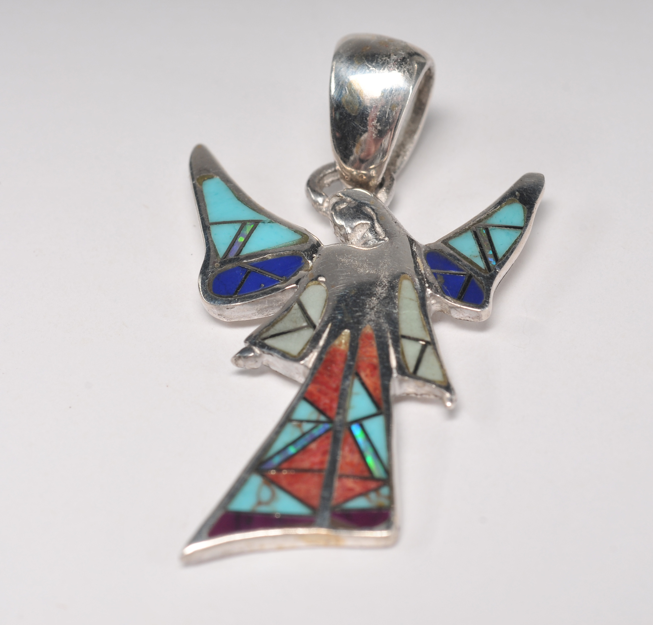 Sterling silver inlaid Southwestern style jewelry