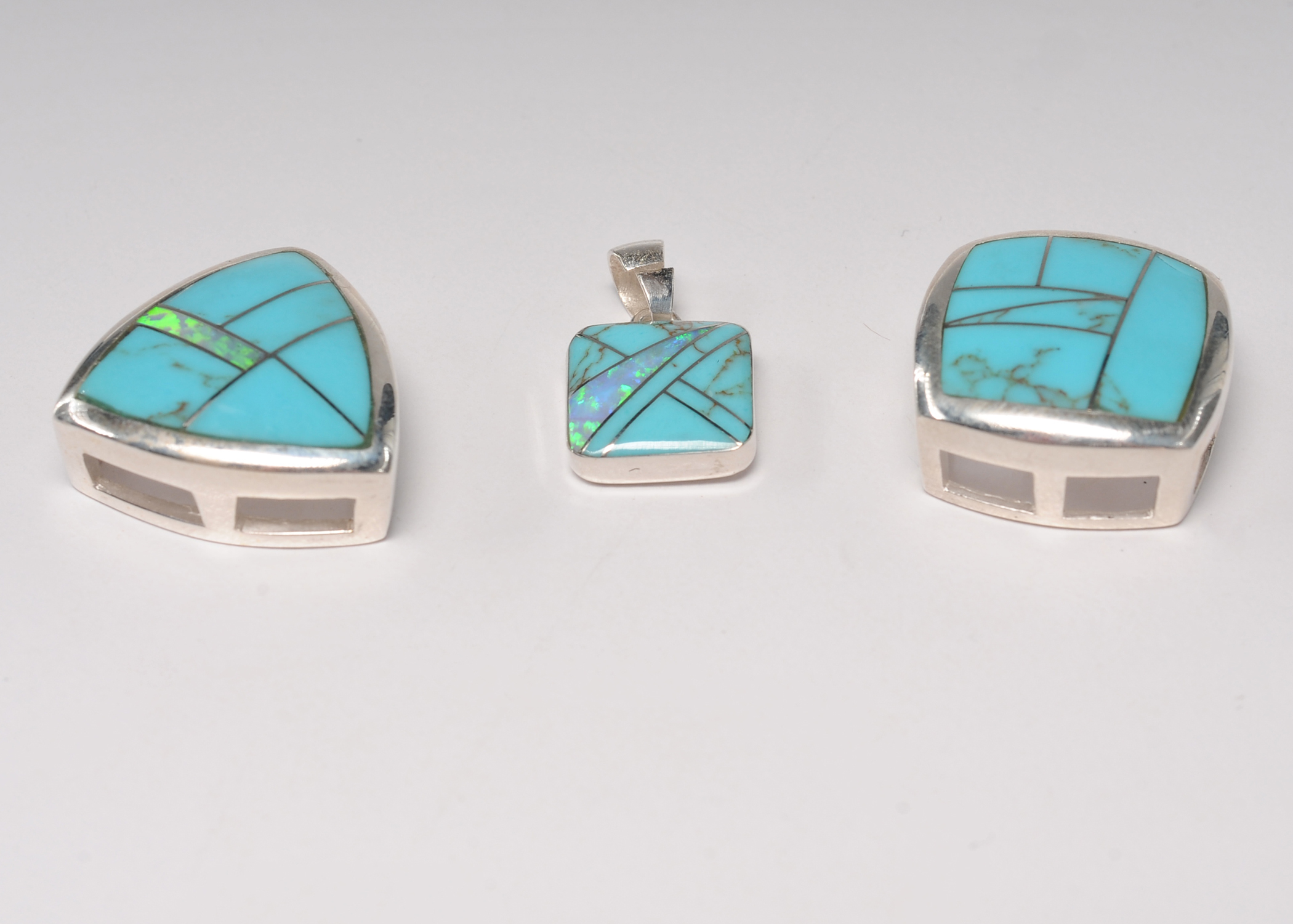 Sterling silver inlaid Southwestern style jewelry