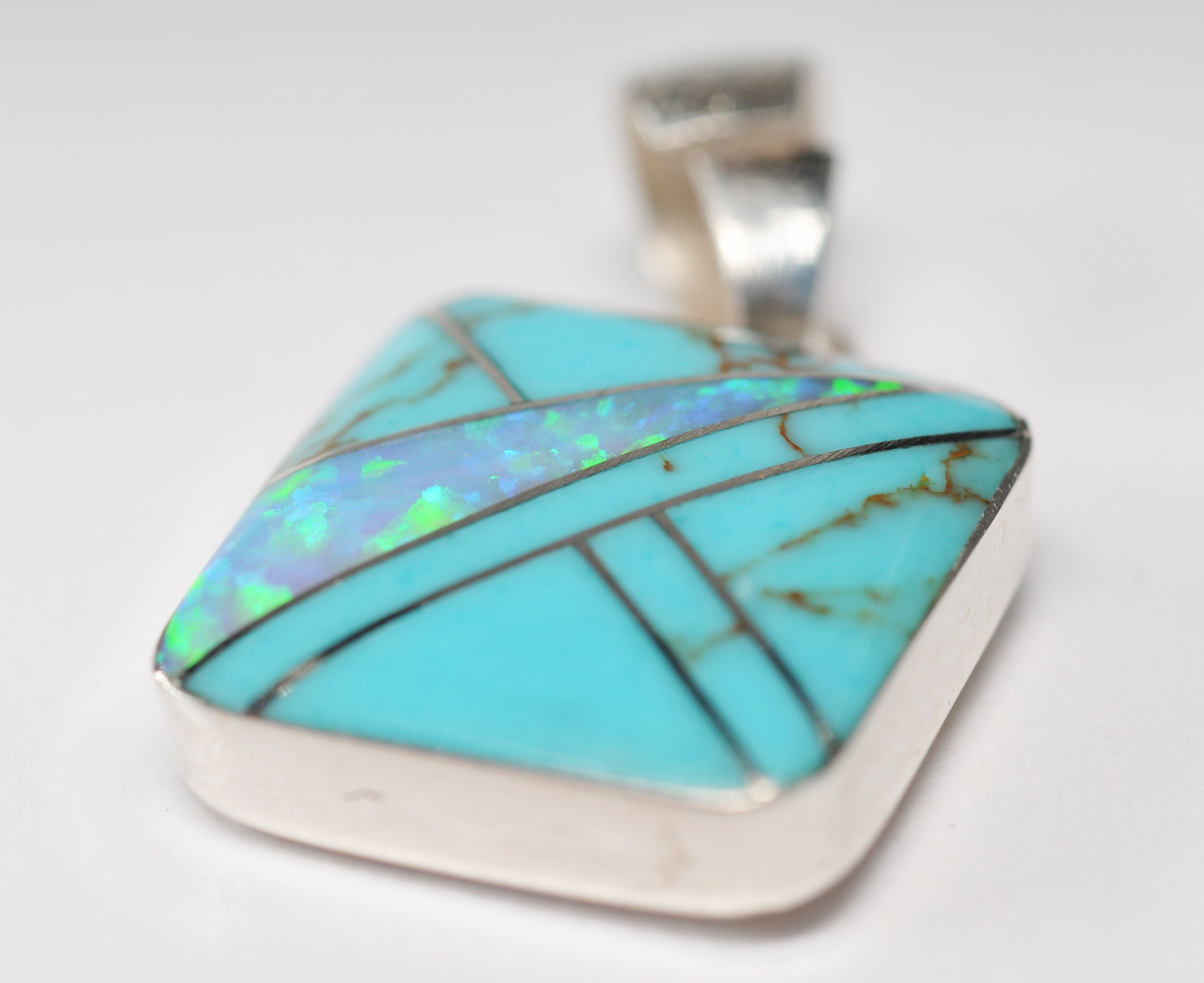 Sterling silver inlaid Southwestern style jewelry