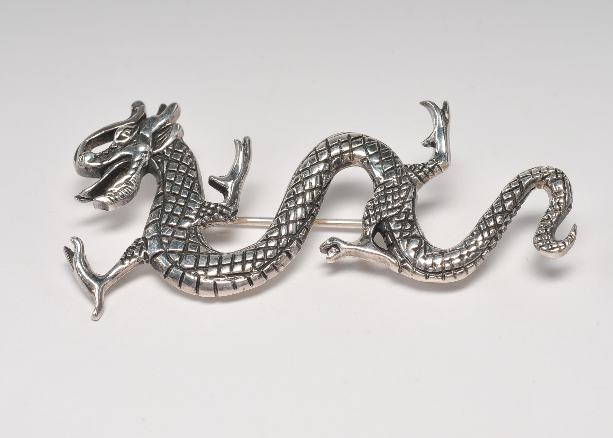 Asian inspired cast sterling silver dragon pin