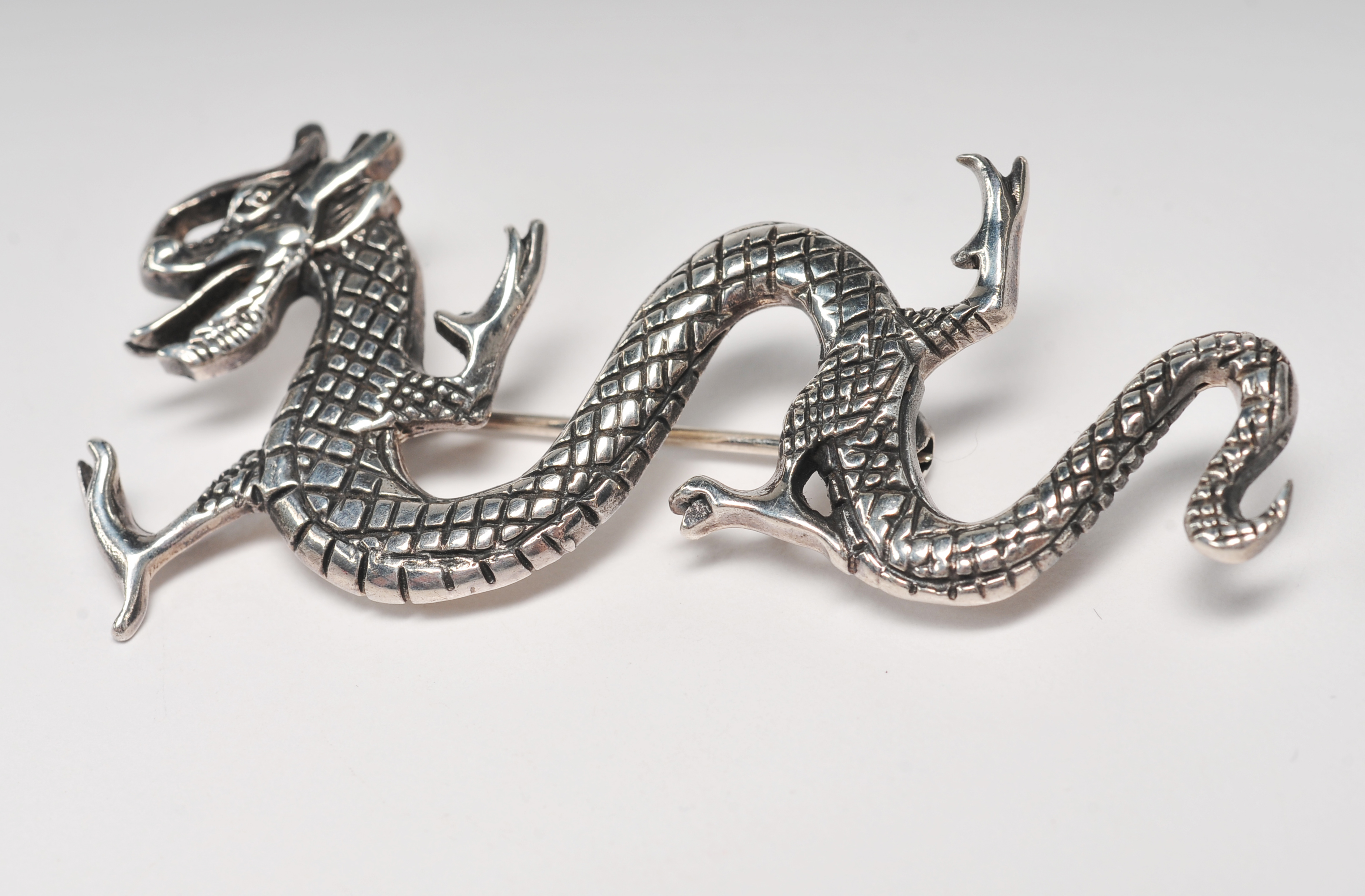 Asian inspired cast sterling silver dragon pin