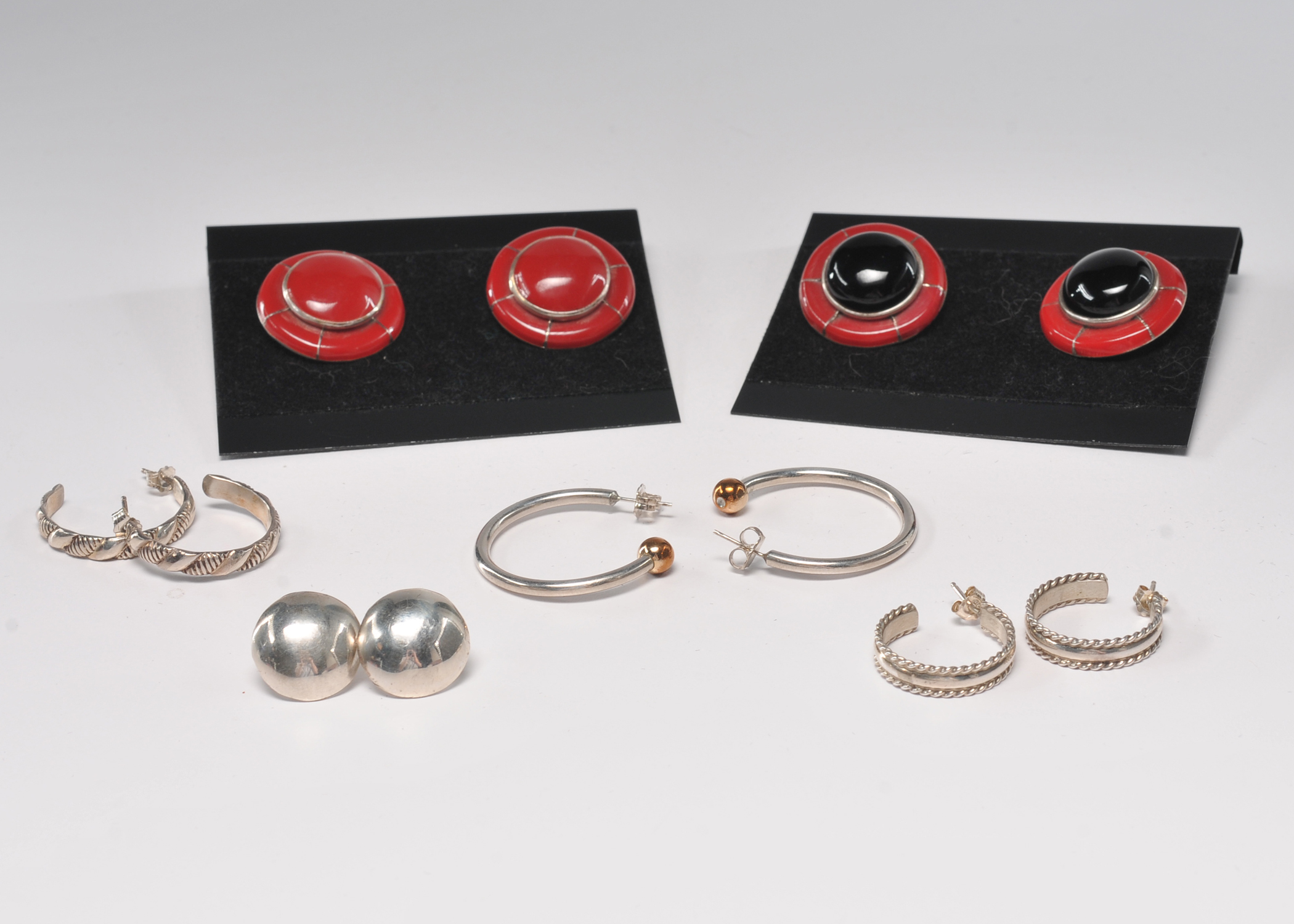 Six pair of sterling silver post earrings 