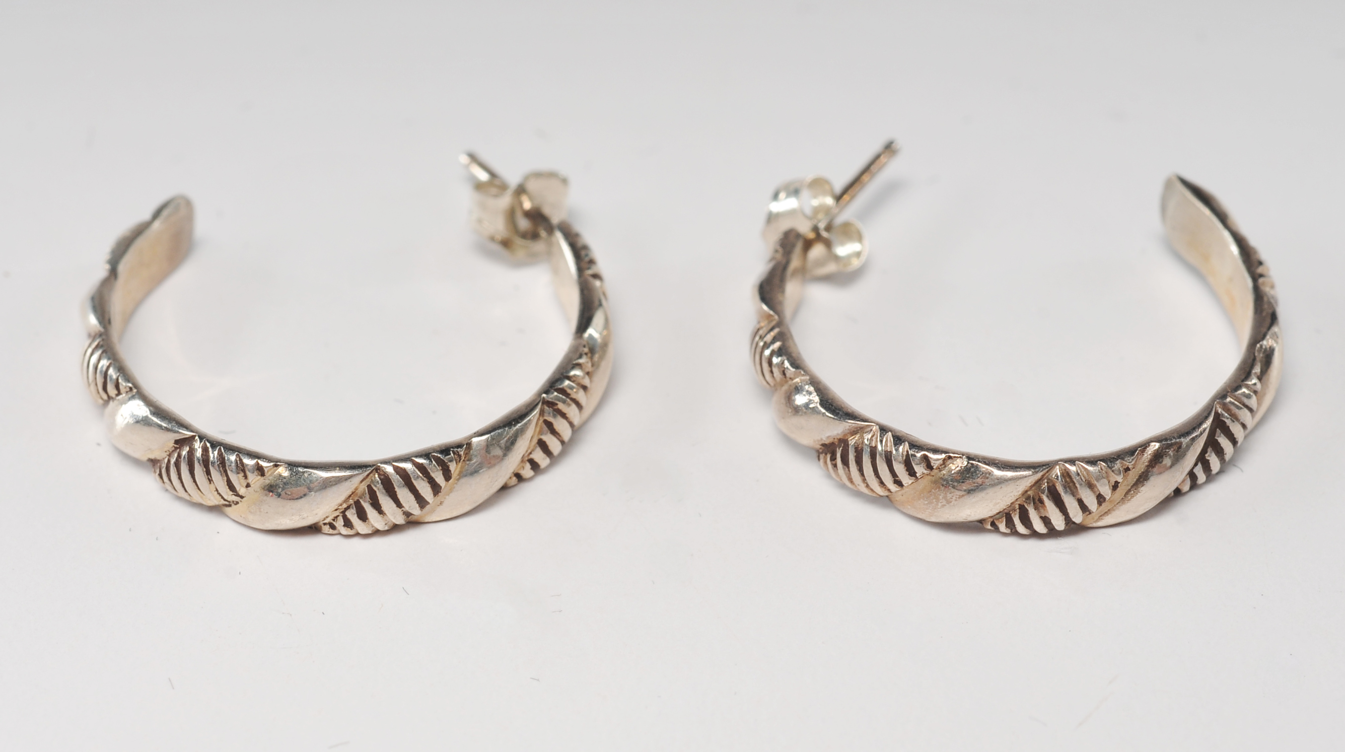 Six pair of sterling silver post earrings 