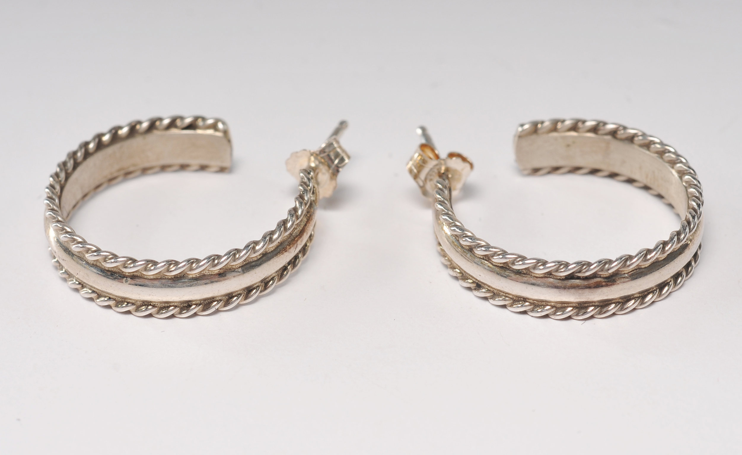 Six pair of sterling silver post earrings 