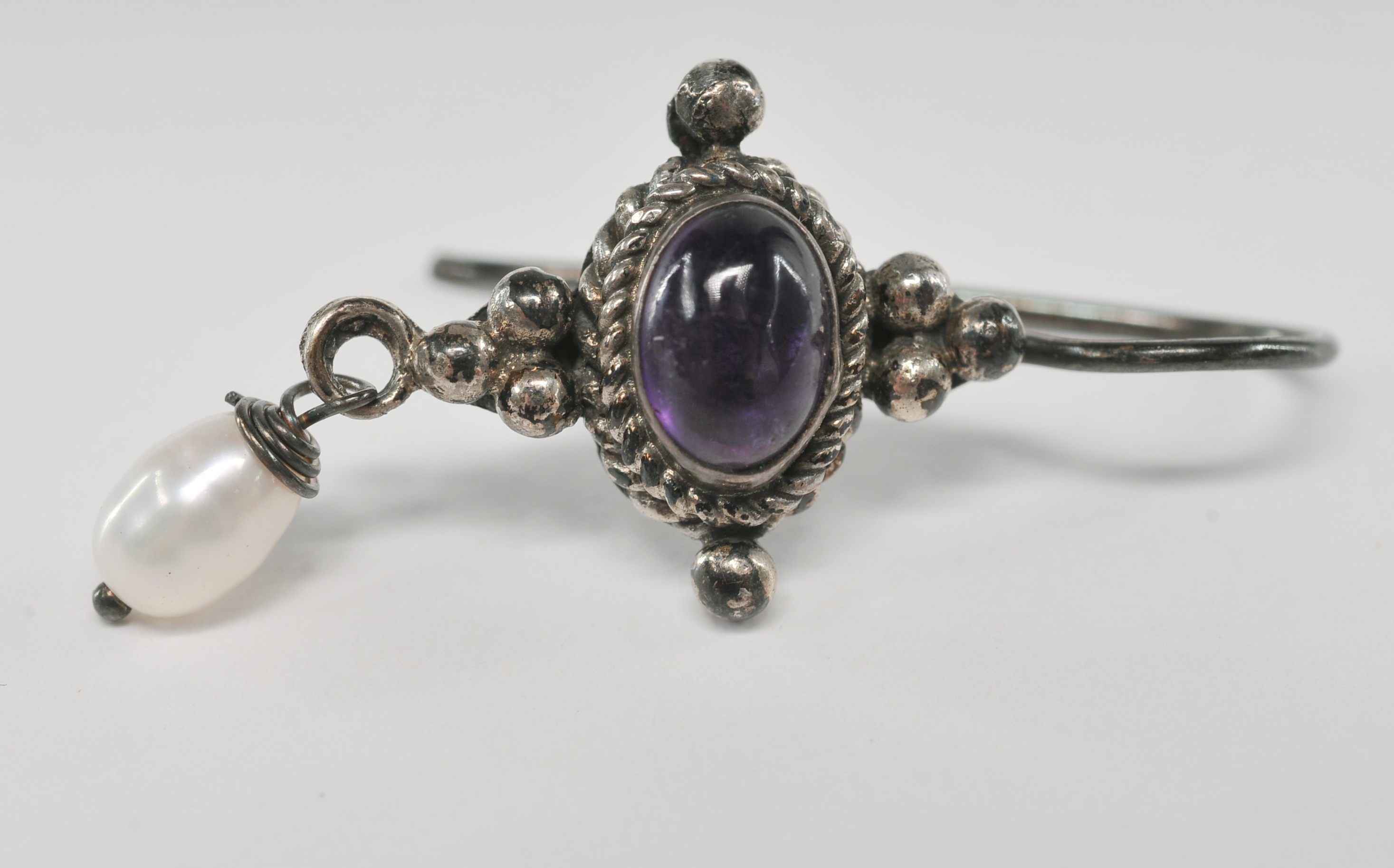 Sterling silver Balinese style amethyst earrings with dangly freshwater pearl