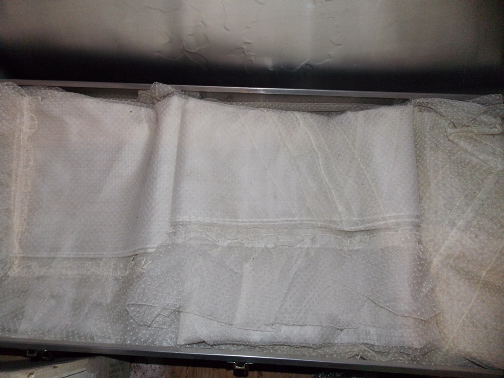 A vast array of Vintage Drapes and Bedspreads