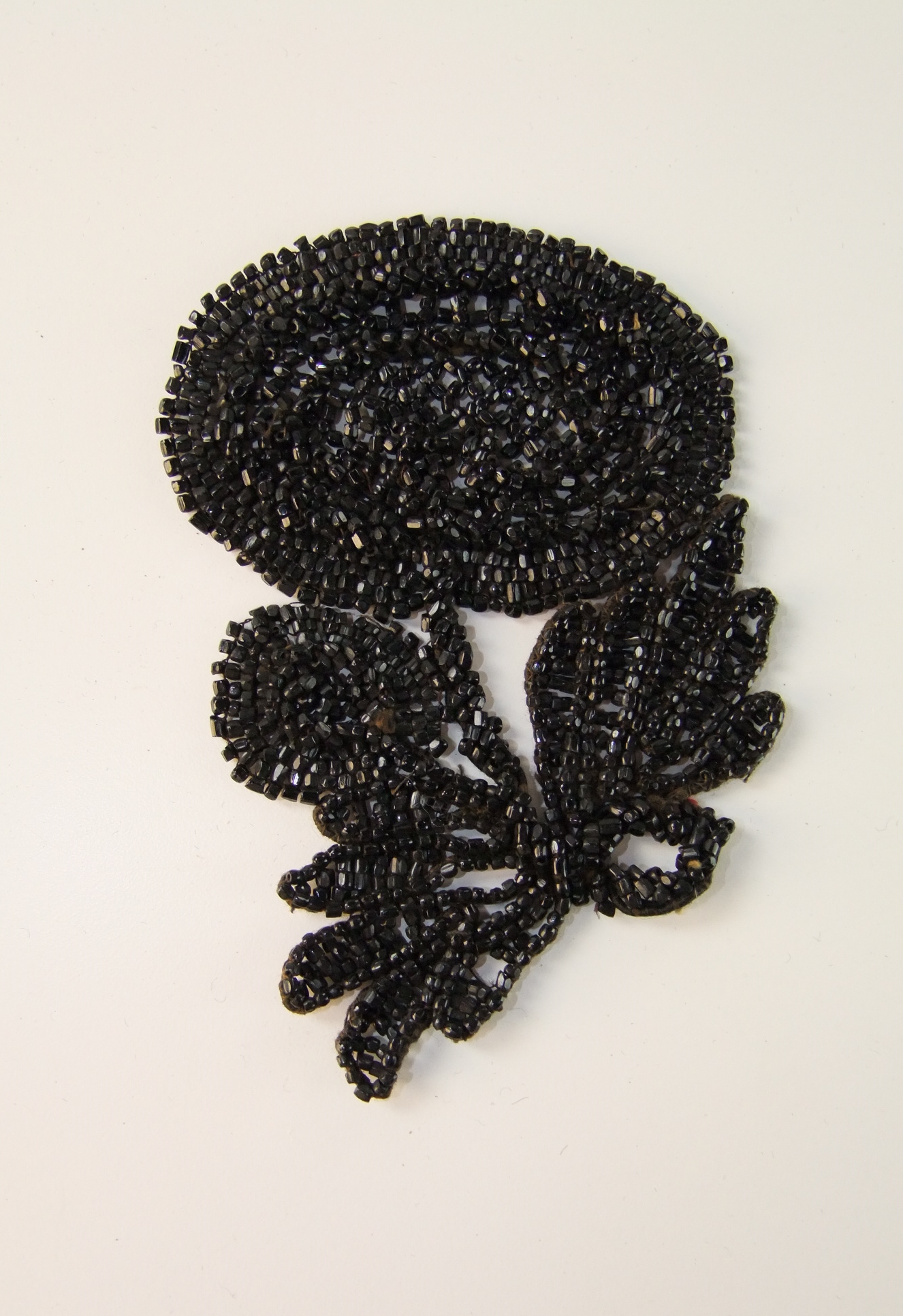 Collection of Victorian and early 20th Century hand beaded adornments and accessories