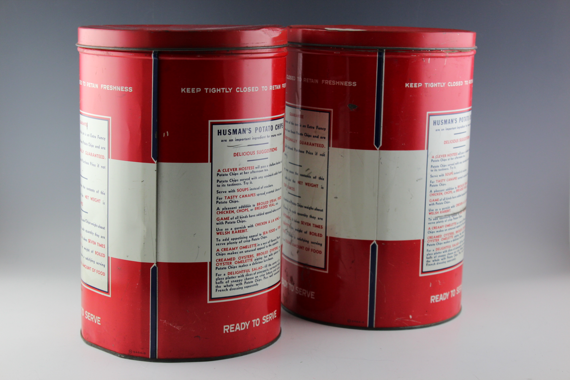 Two Vintage Husman's Potato Chip Tins