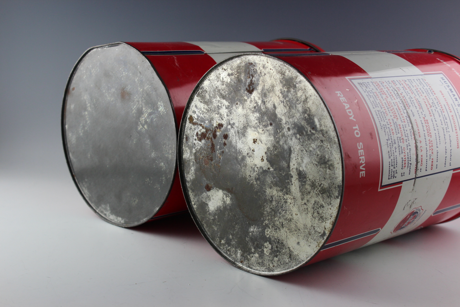 Two Vintage Husman's Potato Chip Tins