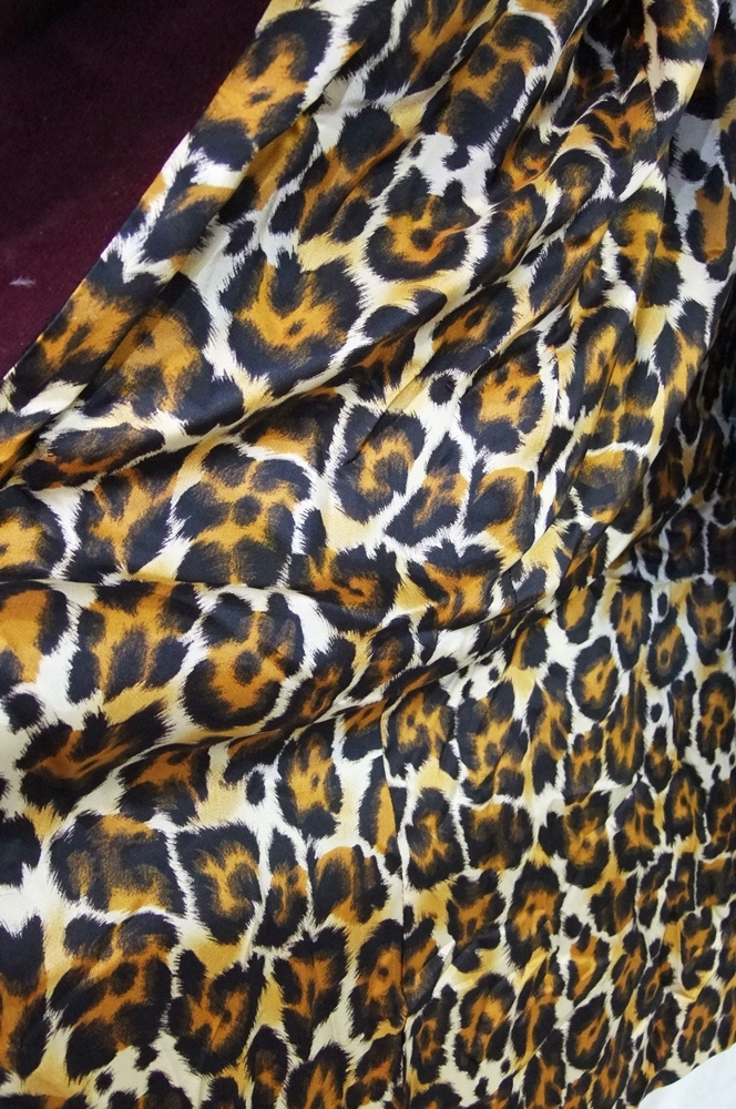 1970's Vintage Henry Harris burgundy overcoat with leopard print lining