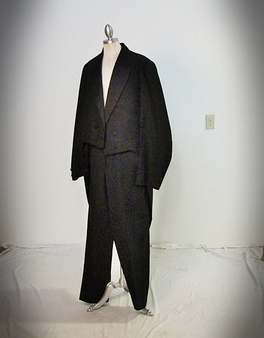 Gentleman's early 19th Century black wool and silk tuxedo with tails
