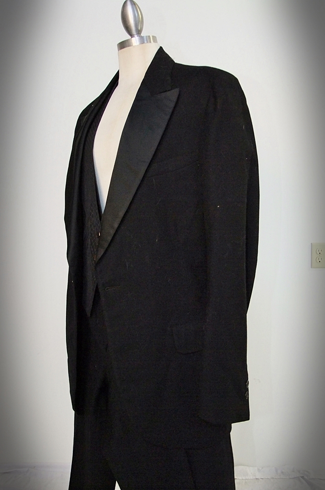Gentleman's early 19th Century black wool and silk tuxedo with tails