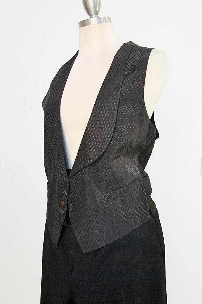 Gentleman's early 19th Century black wool and silk tuxedo with tails