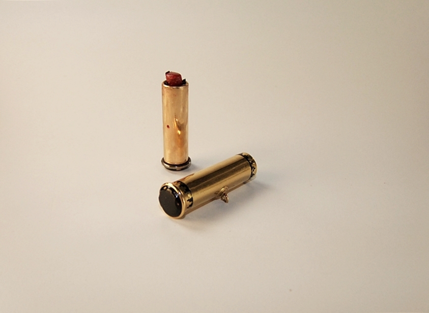 Cartier 18 K yellow gold and black enamel lipstick case pendant