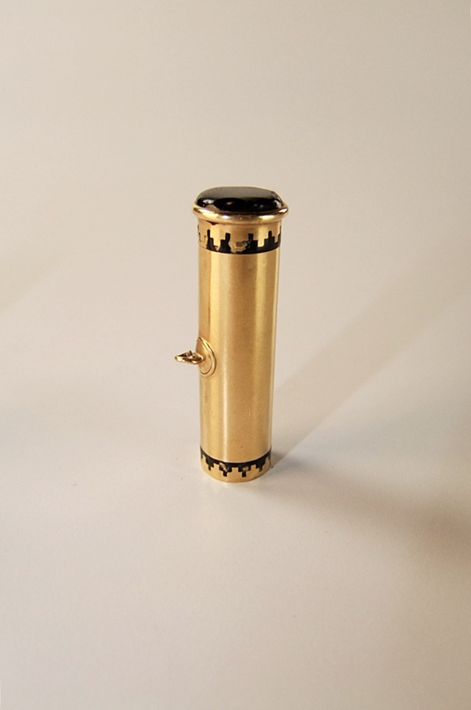 Cartier 18 K yellow gold and black enamel lipstick case pendant