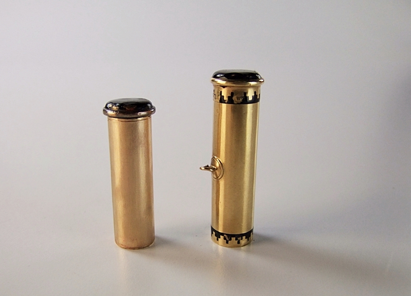 Cartier 18 K yellow gold and black enamel lipstick case pendant